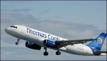 A Thomas Cook passenger plane - cabin crew are to strike against cuts to break times, photo by Arpingstone (Creative Commons)