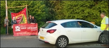 Picketer discusses with car driver; RF Brookes in Rogerstone, Newport, 2.6.16, photo by Dave Reid