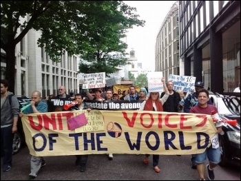 Striking cleaners demonstrate photo United Voices of the World