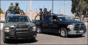 Heavily armed Mexican soldiers and police officers are responsible for lethal repression of workers' struggles, photo by BSMFBSMF