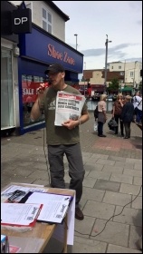Martin selling the Socialist photo Sarah Sachs-Eldridge