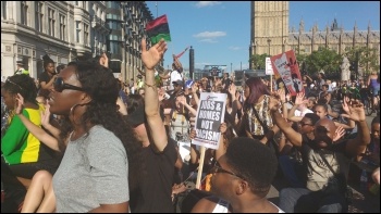 South London #BlackLivesMatter sit-down protest outside Parliament, 6.8.14, photo by James Ivens