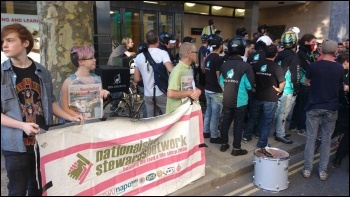 NSSN & Socialist Party brings solidarity to the protest outside Deliveroo head office, photo James Ivens