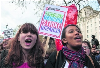 Lily (left) marching with teachers and junior doctors photo Paul Mattsson