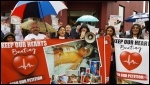 The protest, including Ria Pahwa with megaphone photo Steve Score, photo Steve Score