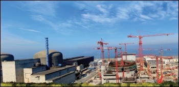 Flamanville nuclear power plant in France is beset by safety and funding problems, and uses the same untested technology as Hinkley C, photo by schoella (Creative Commons)