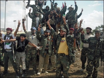 Some of the rebels fighting Gaddafi in 2011, photo by Magharebia (Creative Commons)