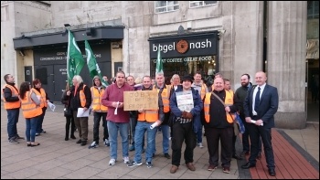 Socialist Party members join RMT strikers on the picket line at Leeds train station photo Leeds SP
