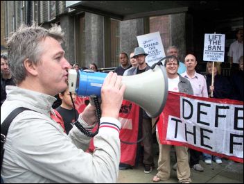 Glen Kelly addresses lobby of Unison HQ to protest against banning from office of Socialist Party members, photo Alison Hill