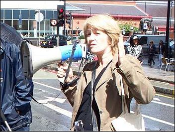 Suzanne Muna addresses lobby of Union HQ to protest against banning from office of Socialist Party members, photo Alison Hill