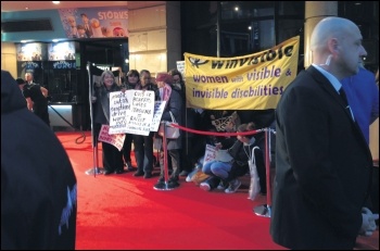 Protesting against welfare cuts outside Ken Loach's 'I, Daniel Blake' premiere in Leicester Square, London, 18.10.16, photo by Amalia