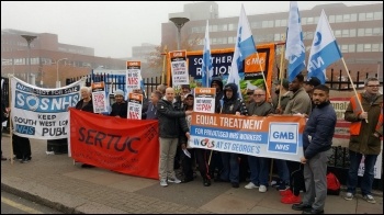 Lively picket line of ambulance workers at St George's hospital in Tooting photo Rob Williams