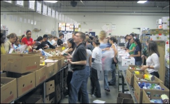 Food bank users, photo James (Creative Commons)