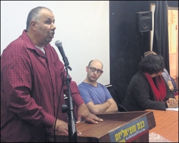 Palestinian activist Mohammed Abu Hummus addresses the Socialism conference in Tel Aviv, photo by Per-Åke Westerlund