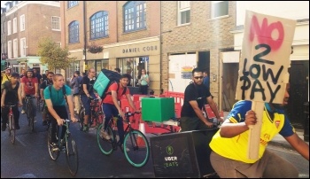 UberEats couriers striking against low pay, photo by Scott Jones