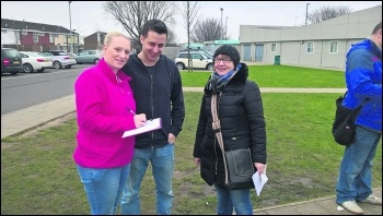 Collecting signatures photo William Jarrett