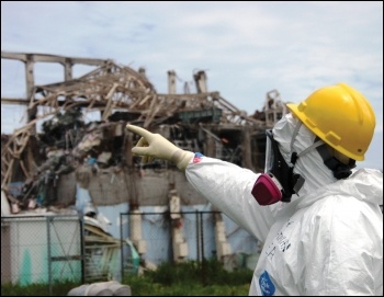 Eight years on, the ruins of the Fukushima power plant are still highly radioactive and hold huge amounts of toxic water, photo Mike Weightman/IAEA (Creative Commons)