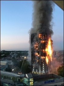 Grenfell Tower on 14 June 2017, photo @Natalie_Oxford (Twitter)