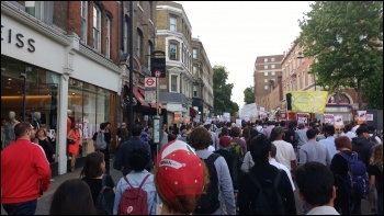 Marching through Kensington to chants of 