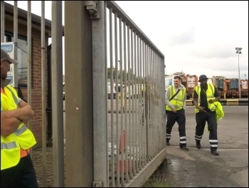 Two agency workers walking out, Tysekey depot, 30.6.17, photo by Bob S