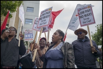 Barts NHS striking cleaners and porters in the Unite union demonstrate in Whitechapel , photo Paul Mattsson