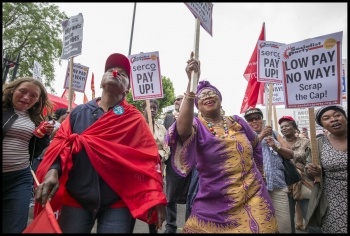 Barts NHS striking cleaners and porters in the Unite union demonstrate in Whitechapel, photo Paul Mattsson