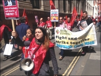 Bank of England strikers march to another site of the bank and an event attended by the bank's governor, then back to their picket line. 3.8.17, photo by Sarah Wrack