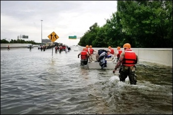 Military relief efforts in Houston after Hurricane Harvey, photo by Texas Army National Guard/CC