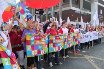  Amy Murphy (holding the end of the banner) on an Usdaw protest, photo Usdaw Activist