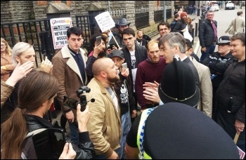 Socialist Students confronting Tory MP Jacob Ress-Mogg in Cardiff, photo by Cardiff Socialist Party