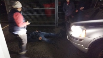 The scene after an academy consultant apparently barged his car into a peaceful protester, photo by James Ivens