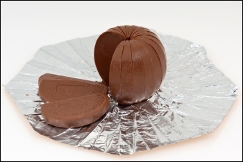 You now get less chocolate orange for the same price - increasing profits while cutting your chocolate, photo by Evan-Amos (CC)