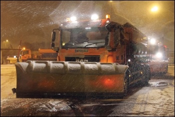 Businesses get their roads gritted while working class homes are left isolated, photo by Highways England (CC)