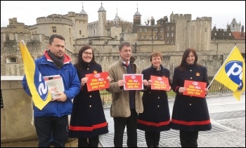 Assistant general secretary Chris Baugh (centre), with PCS members outside the Tower of London for the 31 January PCS pay day protests., photo Paula Mitchell