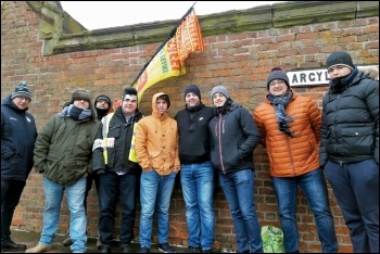 The RMT picket line in Birkenhed was joined by Elvis (fourth from left), 3.3.18, photo by Hugh Caffrey