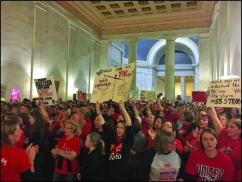 Striking teachers inside the West Virginia legislature capitol building, photo Socialist Alternative