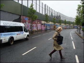 One of the Belfast 'peace walls' dividing Protestant from Catholic areas, photo Nick/CC