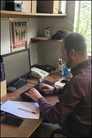 Workplace and campaigns editor Scott editing an article