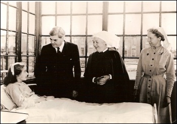 Labour’s Nye Bevan speaking to one of the first patients to be cared for under the newly founded National Health Service. photo University of Liverpool/CC