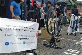 Uber Eats riders protest outside the firm's Cardiff office, 3.9.18, photo by Ross Saunders