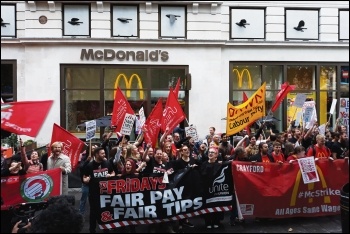 Catering and courier workers on their joint strike rally in Leicester Square, 4.10.18, photo by Scott Jones