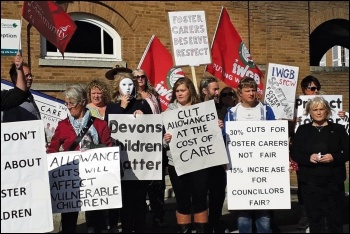 Foster carers and supporters protest outside a Devon Council meeting, photo by Sean Brogan