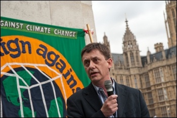 Chris Baugh speaking at a climate protest.  photo Socialist Party