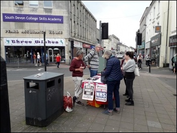 Socialist Party NHS campaign stall in Newton Abbot 18 May, photo Sean Brogan