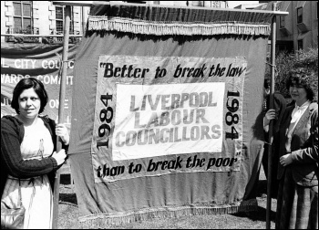 Pauline Dunlop (left) with the Liverpool 47 councillors' banner, photo Militant