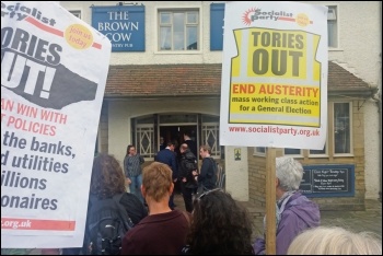 Protesting against Esther McVey in Bingley, 30.5.19, photo by Iain Dalton