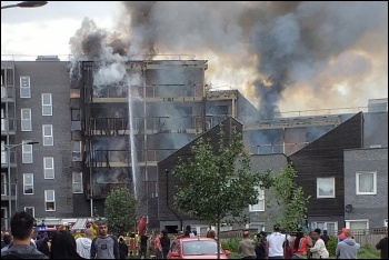 London firefighters putting out the fire on Barking Riverside estate, 9.6.19, photo Pete Mason London firefighters putting out the fire on Barking Riverside estate, 9.6.19, photo Pete Mason