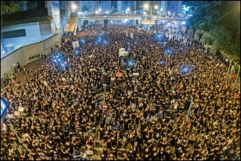 An estimated two million hit the streets of Hong Kong, photo by Studio Incendo/CC