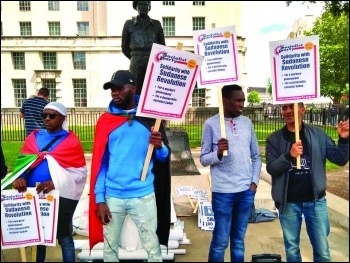 Downing Street protest against Sudanese repression, photo Naomi Byron