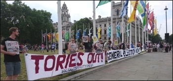 Socialist Party members protesting outside parliament against Boris Johnson, photo S. Stanicic
